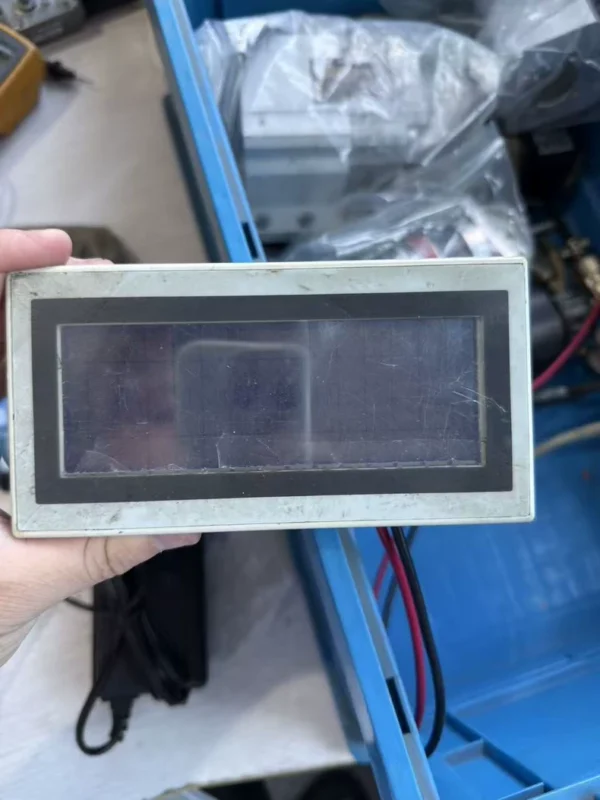 Mitsubishi F930GOT-BWD-C touch screen, used part, condition as shown in the picture, can display when powered on, faint characters, broken screen, sold as accessories, no guarantee on functionality, no returns or exchanges.