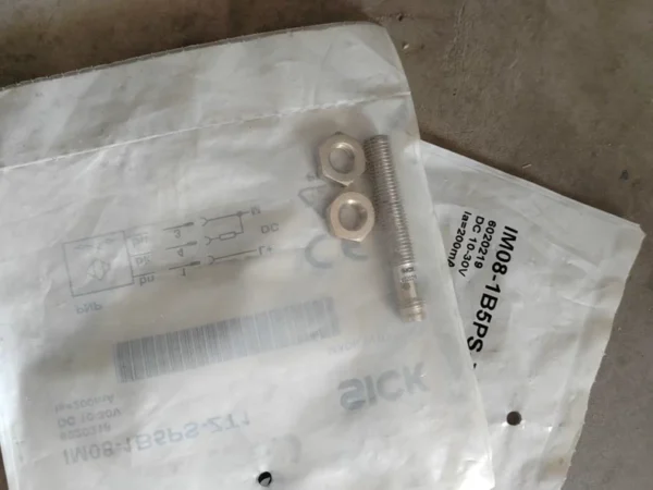 There are 4 SICK proximity switches IM08-02BPS-ZT1.